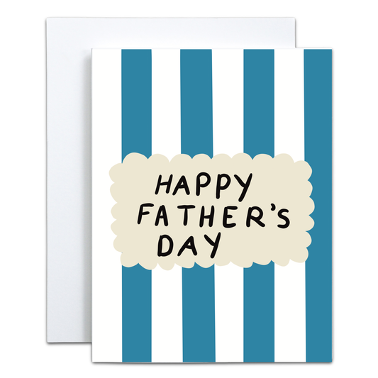 A Father's Day greeting card with vertical blue and white stripes, featuring a cream-colored cloud shape in the center with the text 'HAPPY FATHER'S DAY' in black handwritten font. A white envelope is partially visible behind the card.