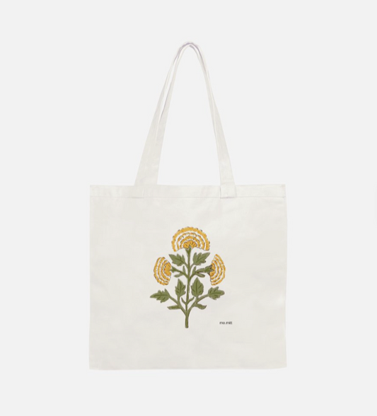 Marigold floral cotton canvas tote bag featuring an Indian-inspired botanical flower design in yellow and green